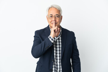 Middle age Brazilian man isolated on white background showing a sign of silence gesture putting finger in mouth