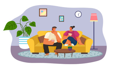 Woman and man looking movie at home. People holding popcorn in hands and talking sitting on couch or sofa. Happy couple spending time together at home. People at quarantine isolation at home