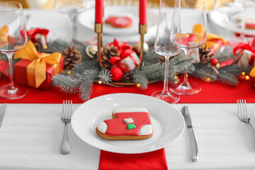 Beautiful table setting with Christmas decorations in living room