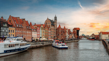 Naklejka na ściany i meble Sunset over the Motława River in Gdańsk