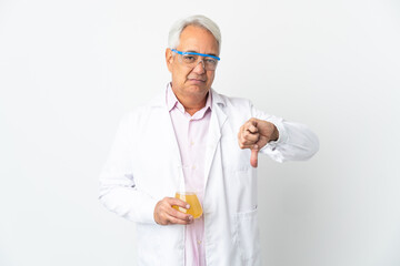 Middle age Brazilian scientific man scientific isolated on white background showing thumb down with negative expression