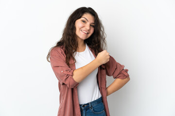 Teenager Russian girl isolated on white background celebrating a victory
