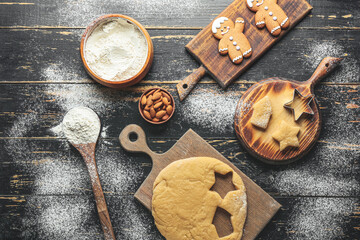 Preparing of gingerbread cookies on table