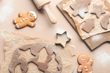 Fresh dough for gingerbread cookies and cutter on color background