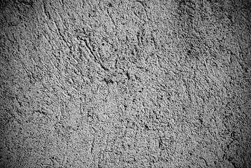 Fototapeta na wymiar Abstract grungy wall background in a low key. Wall background in black and white.