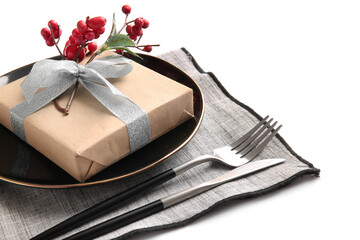 Beautiful Christmas table setting with mistletoe on white background