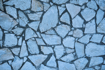 blue old broken wall of the facade, blue background