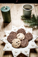 top view of beige and green Christmas decorations cozy home hygge