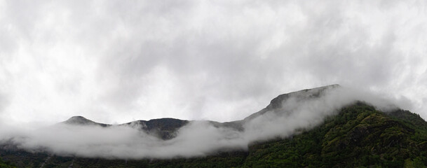 Foggy Cloudy Mountains and Green Hills	