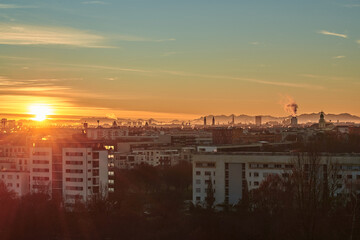 Aerial view of the sunrise in Munich, Germany. Beautiful sunrise in Munich with view on the alps.