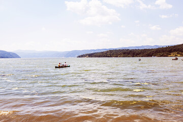 Adventure on the water, exploring, kayaking on the river, group of kayakers on Danube river. Beautiful summer nature landscape.