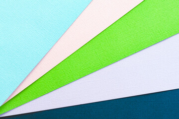 Abstract color papers geometry flat lay composition banner background with green, pink, blue color tones
