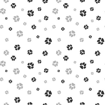 Cat and dog footprints seamless pattern. Pets or animals paw print. Vector isolated on white