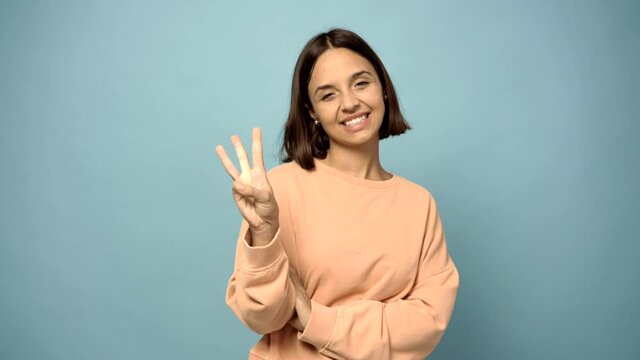 woman happy and counting with fingers