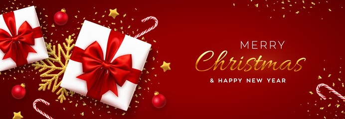 Fototapeta na wymiar Christmas banner. Realistic white gift boxes with red bow, gold stars, shiny golden snowflake, balls and candy canes. Xmas red background, horizontal poster, greeting card, header website. Vector.