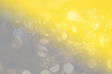 Abstract light, illuminating yellow and gray bokeh pattern in gradient, background image, colors of the year 2021