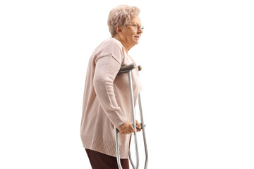 Elderly woman with crutches