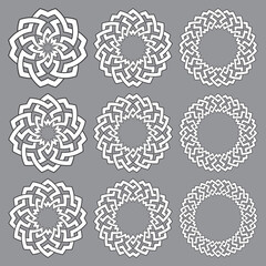 Set of round frames. Nine decorative elements for design with stripes braiding borders. White lines with black strokes on gray background.