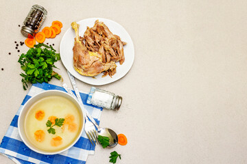 Transparent chicken broth with boiled meat