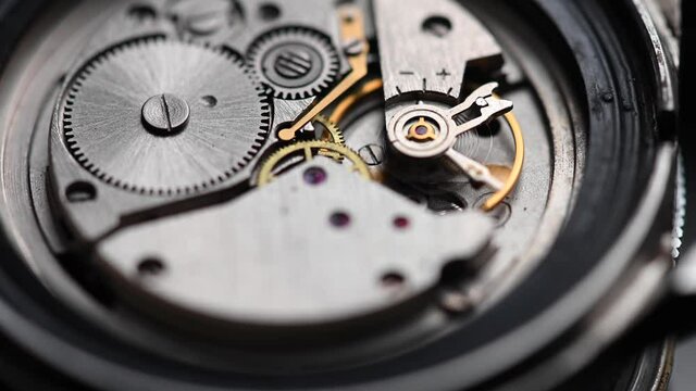 Working gear mechanism of an old wrist watch in macro. Close-up
