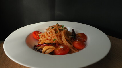 pasta cooking with tomato sauce and chili and garlic,OLYMPUS DIGITAL CAMERA