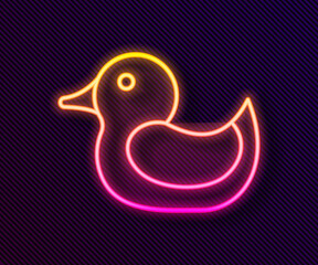 Glowing neon line Rubber duck icon isolated on black background. Vector.