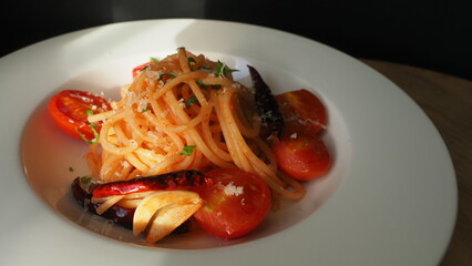 pasta cooking with tomato sauce and chili and garlic,OLYMPUS DIGITAL CAMERA