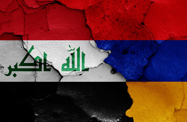 flags of Iraq and Armenia painted on cracked wall