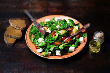 Healthy salad with spinach and white cheese. The keto diet is friendly. Healthy food concept.