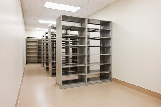 Computer server cabinets in empty office.