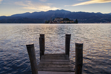 Wooden pier on lake Orta, Piedmont, Italy