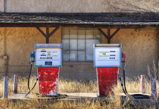 Gas pumps in an abandoned filling petrol station.