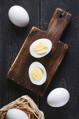 Boiled chicken eggs, cooking. Natural source of protein, healthy food. Cooked Breakfast, poultry eggs, rustic style
