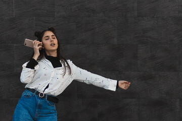 cute girl, attractive, young girl dancing and listening to music, entertainment concept