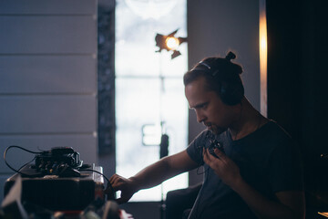 Sound engineer with a microphone on the set.