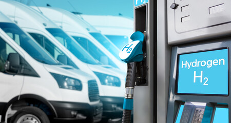 Self service hydrogen filling station on a background of vans