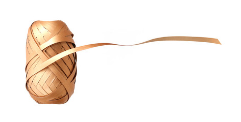 Festive gold ribbon roll isolated on a white background