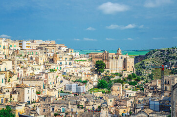 Fototapeta na wymiar Aerial panoramic view of Matera historical centre Sasso Barisano of old ancient town Sassi di Matera with rock cave houses and stone buildings, UNESCO World Heritage Site, Basilicata, Southern Italy