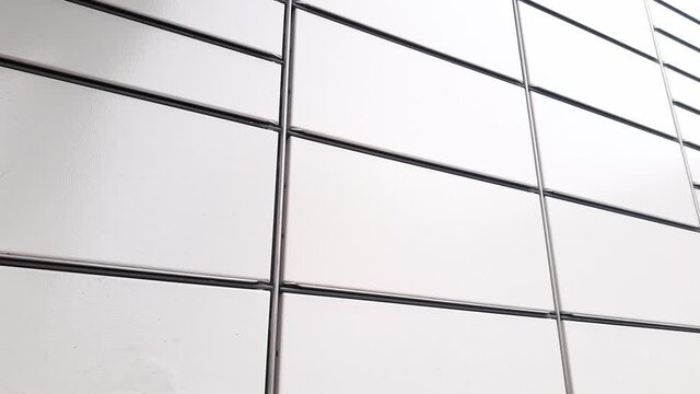 Courier Puts Cardboard Package Into Parcel Locker