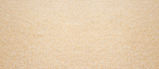 Fototapeta na wymiar Sand beach texture background banner with copy space