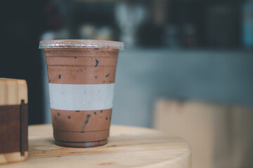 Iced mocha in take away plastic cup.