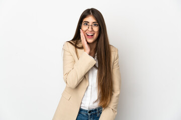 Fototapeta premium Young caucasian woman isolated on white background with surprise and shocked facial expression
