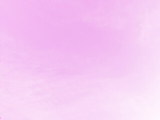 Pink sky background with white clouds.Pink background