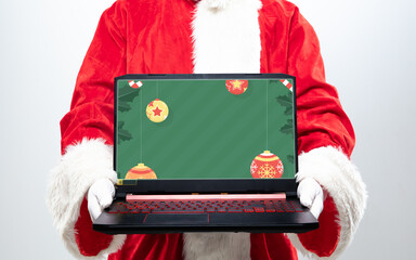 Close up hands of Santa Claus holding device with stylish design on the screen, copyspace. Concept...