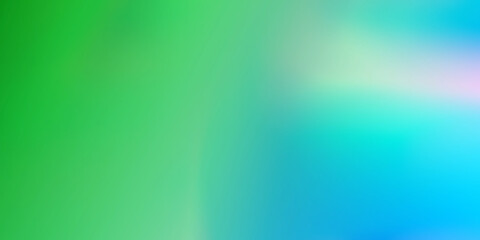 Blurred background with light green and blue colors.