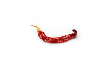 Dry single alone red hot chilli pepper isolated on the white background