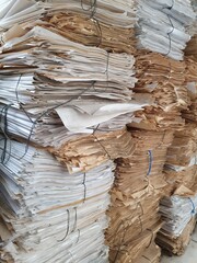 Stacks of tied waste paper for disposal.