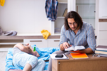 Young son student and dad alcoholic