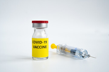A single bottle vial of Covid-19 coronavirus vaccine and syringe. A covid-19 coronavirus vaccination concept. It use for prevention and immunization. Vaccine concept on white background.