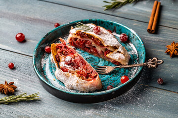 cherry strudel with cranberries and walnut, traditional cuisine. berry pie